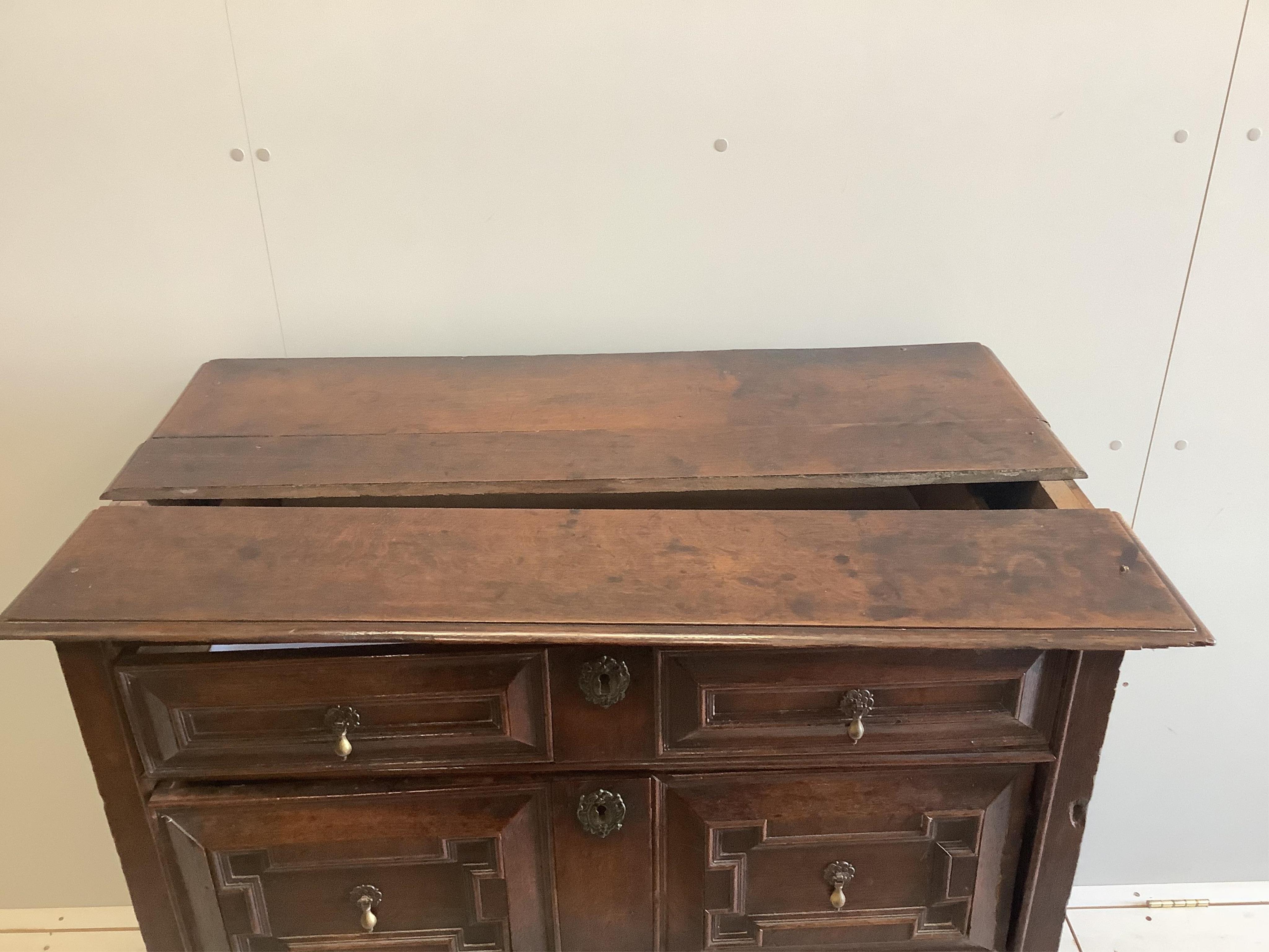 A late 17th century oak chest of drawers (one plank loose on top), width 103cm, depth 56cm, height 108cm